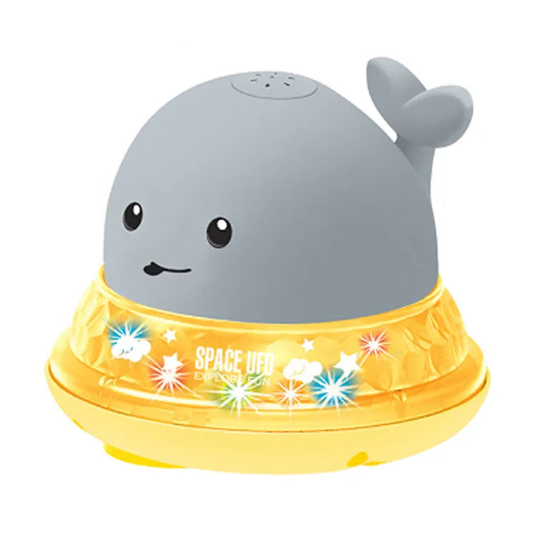 Automatic water-sensing whale bath toy with spray, lights, and music functions for baby bath time