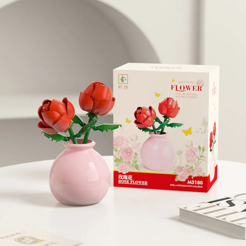 Assembled plastic building block flower in vase on tabletop