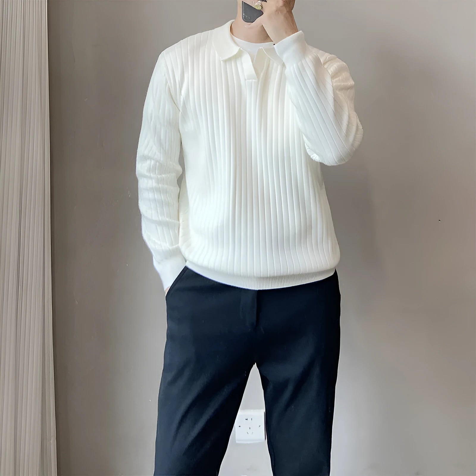 Men's grey striped knitted sweater with a lapel collar, shown in a loose fit.