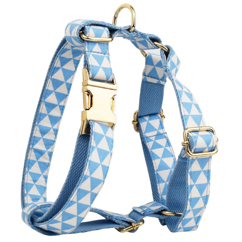 Blue triangular ring rope dog harness set with collar, lead, decorative bow and vest on cloth material
