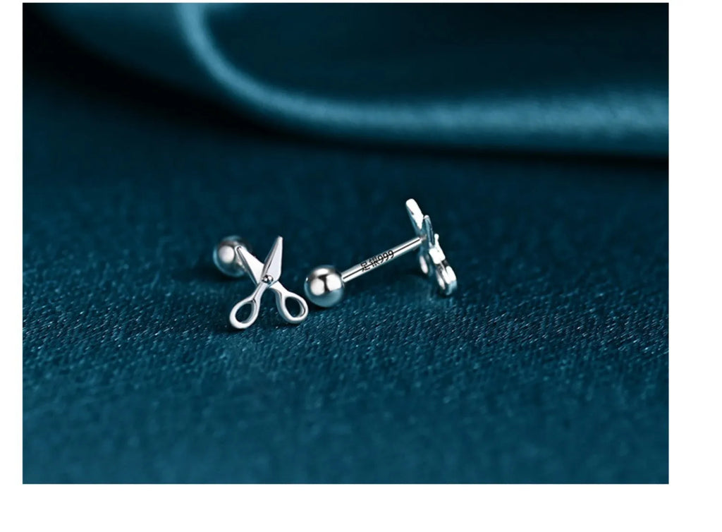 Small silver ear nails with miniature scissors design and screw-back fitting