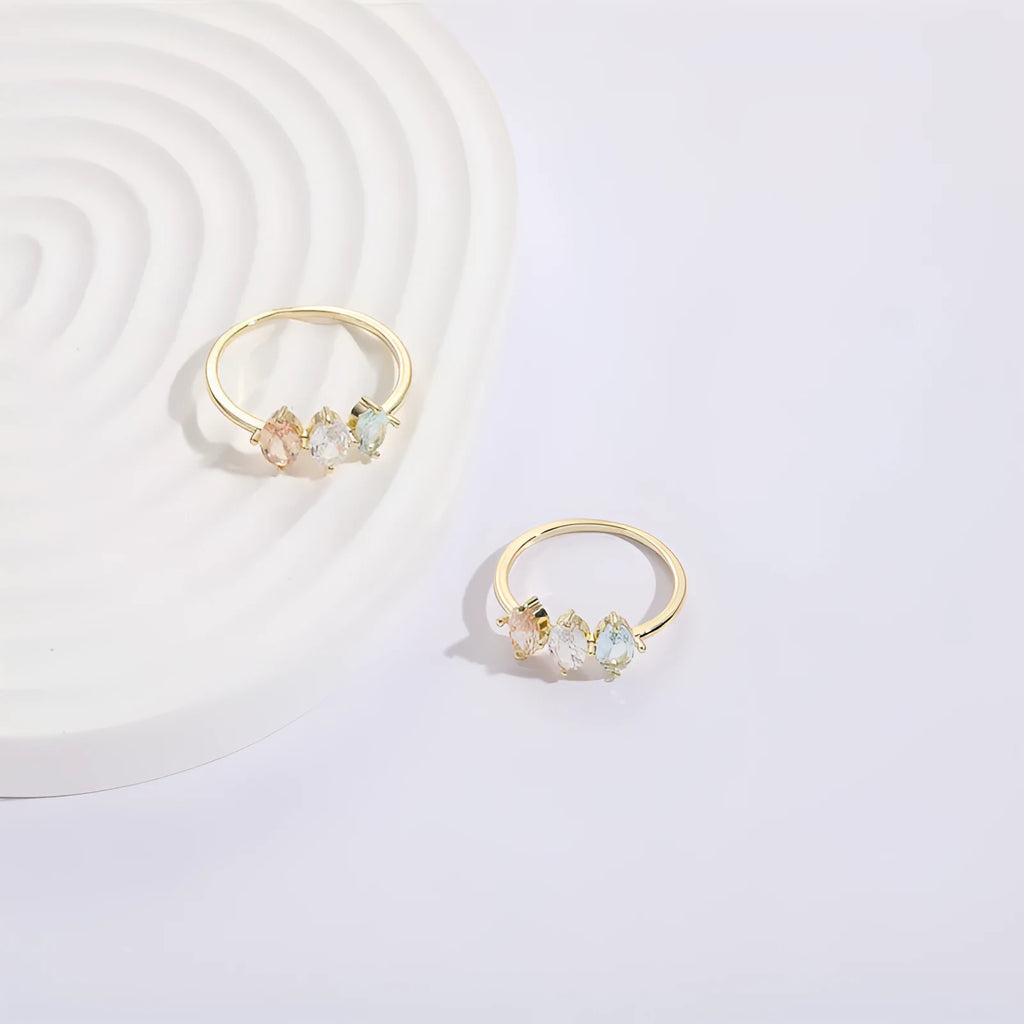 Geometric triangle design women's ring with horse eye motifs and tricolor zircon stones in 14k gold colour