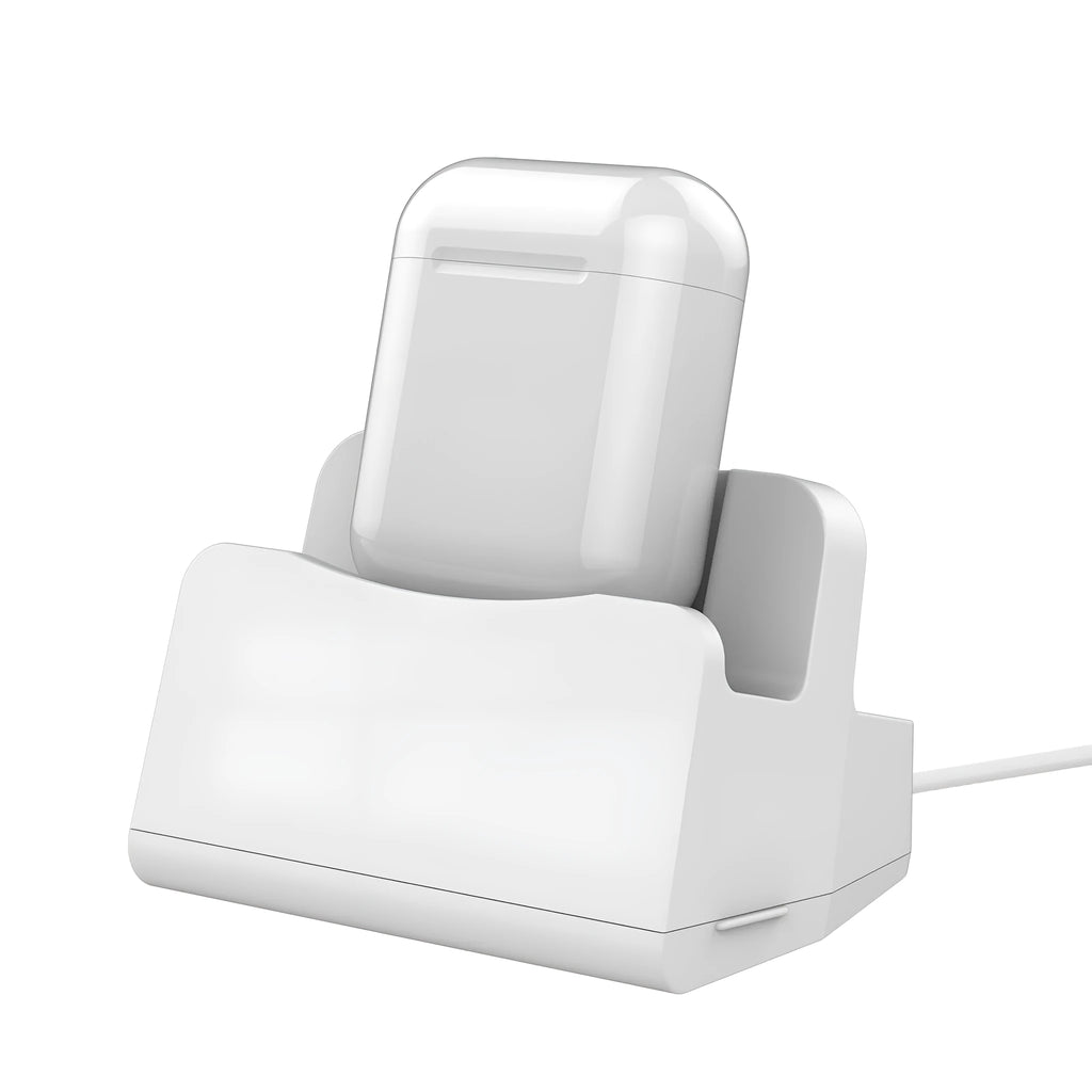 White headphone charging base stand on a desktop holding a gaming headset