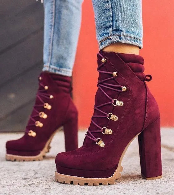 Women's suede high heel ankle boots with thick heel in army green, featuring round toe and Roman-style rivet details.