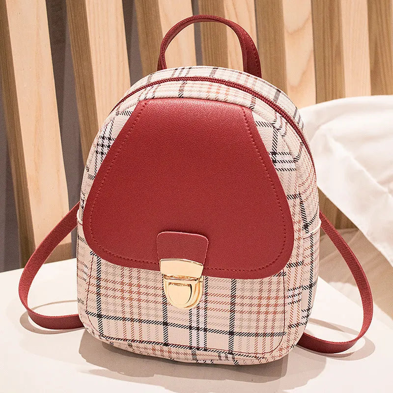 One shoulder diagonal phone bag in PU material, shown in a choice of black, blue, brown, pink, or red.