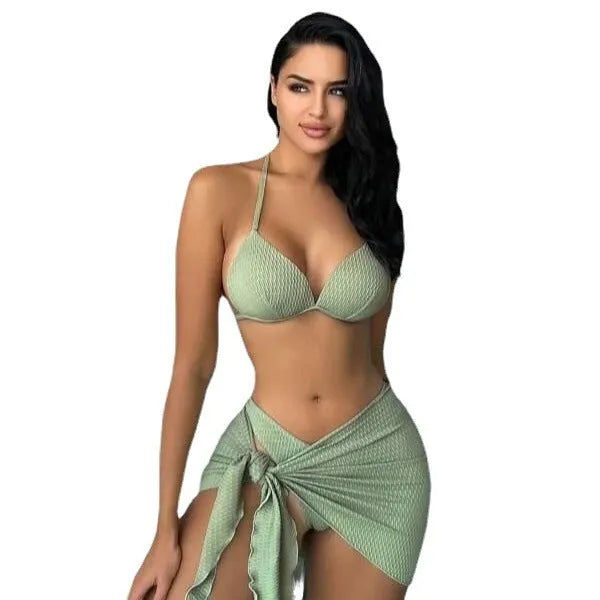 Women's sexy Russian split style three-piece swimsuit set in avocado green, laid flat showing top, panties, and skirt.