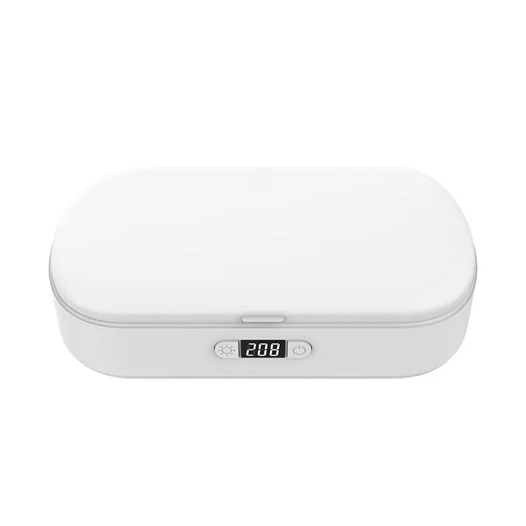 White ABS plastic UV steriliser box with wireless charging pad for phones and personal items