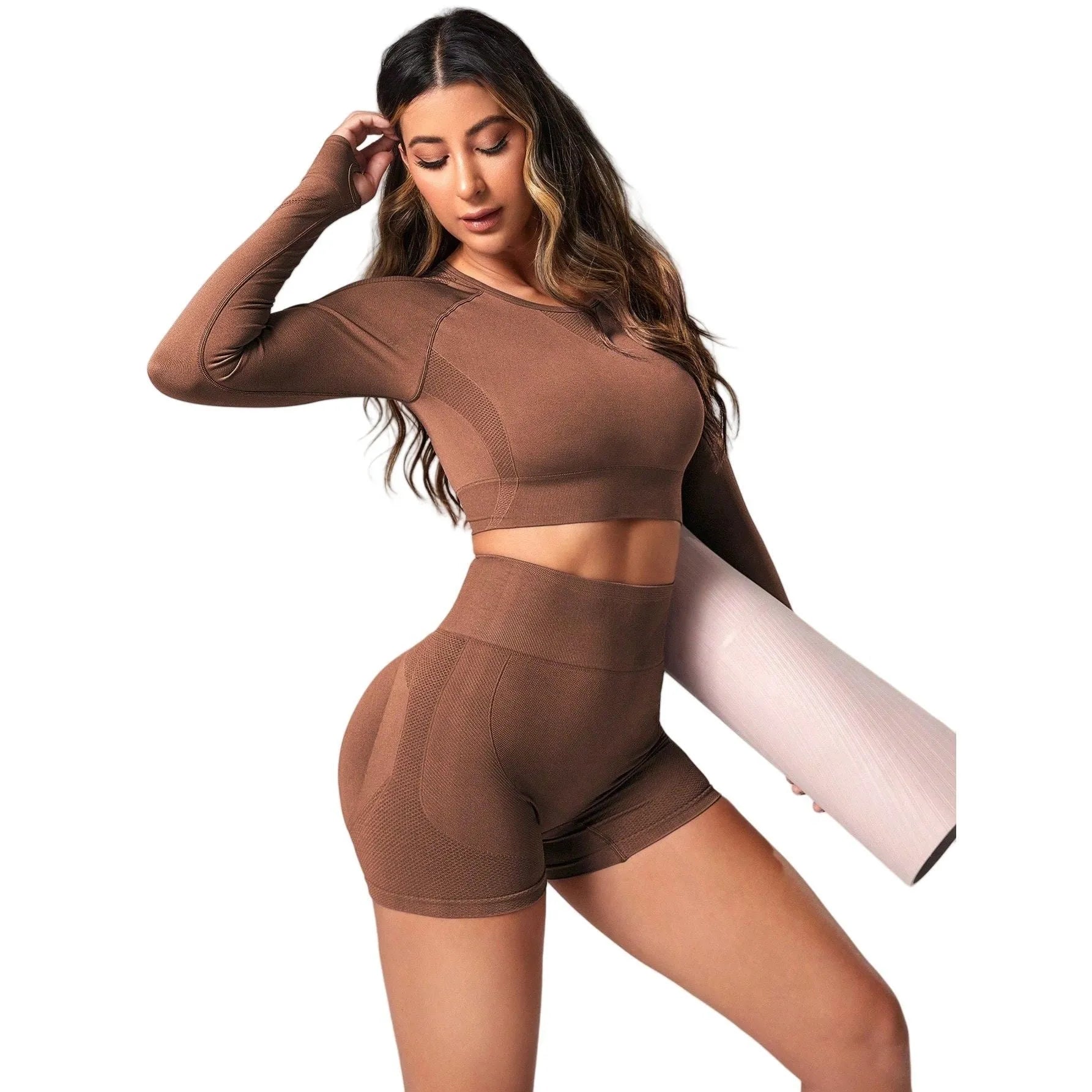 Women's black yoga clothes two-piece set showing long sleeve top and high-waist tight pants.