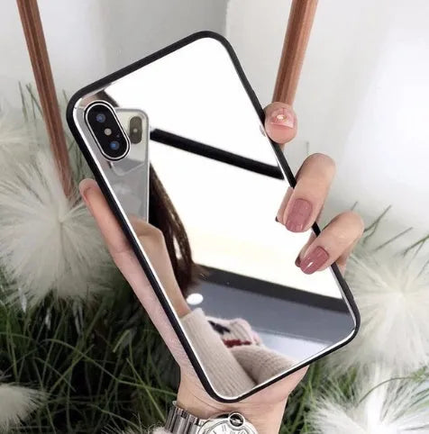 Black iPhone case with a built-in rectangular mirror on the back cover, compatible with iPhone X, 7 Plus, 8 Plus, and 12 models.