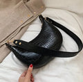 Retro crossbody bag for women in PU leather with 24cm top width, black colour, compact design