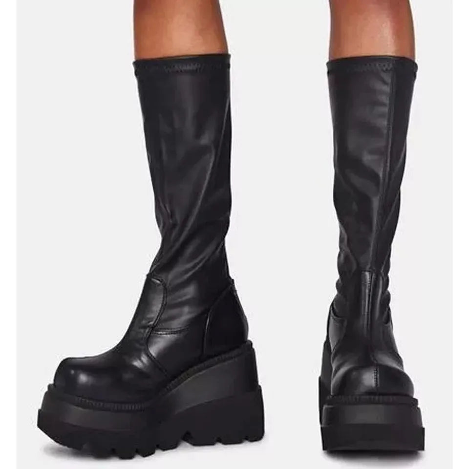 Women winter platform boots in black with front tie lace-up and genuine leather upper