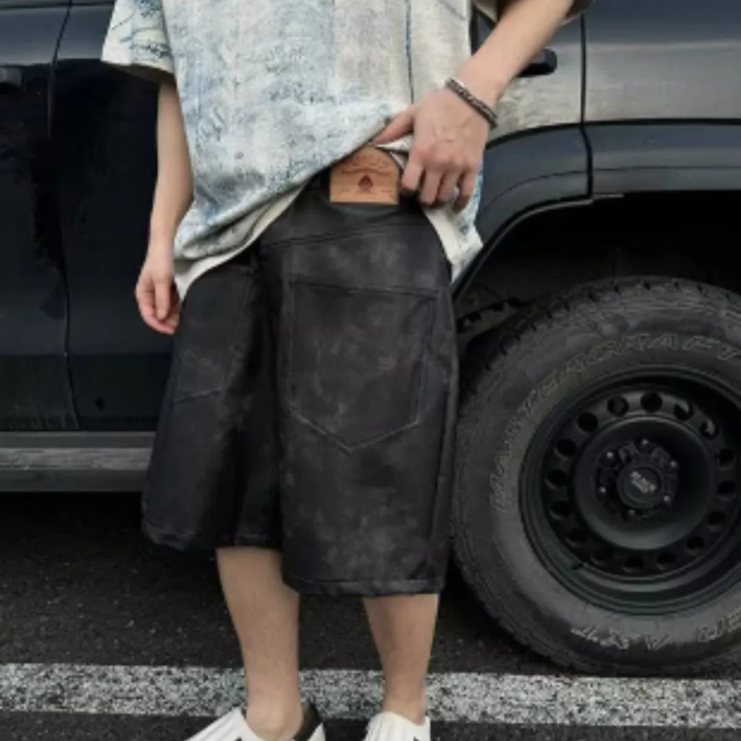 Korean-style loose fit T-shirt with distressed summer wash and tie dye print on solid colour polyester.