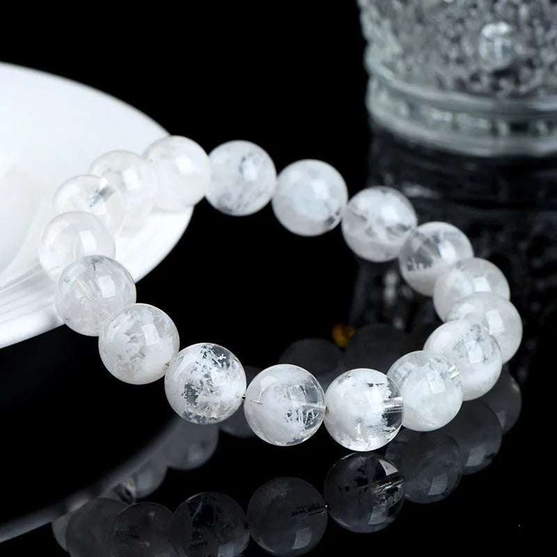 Women's crystal bracelet with natural blizzard snowflake round beads featuring Ruyi and Xiangyun traditional design elements