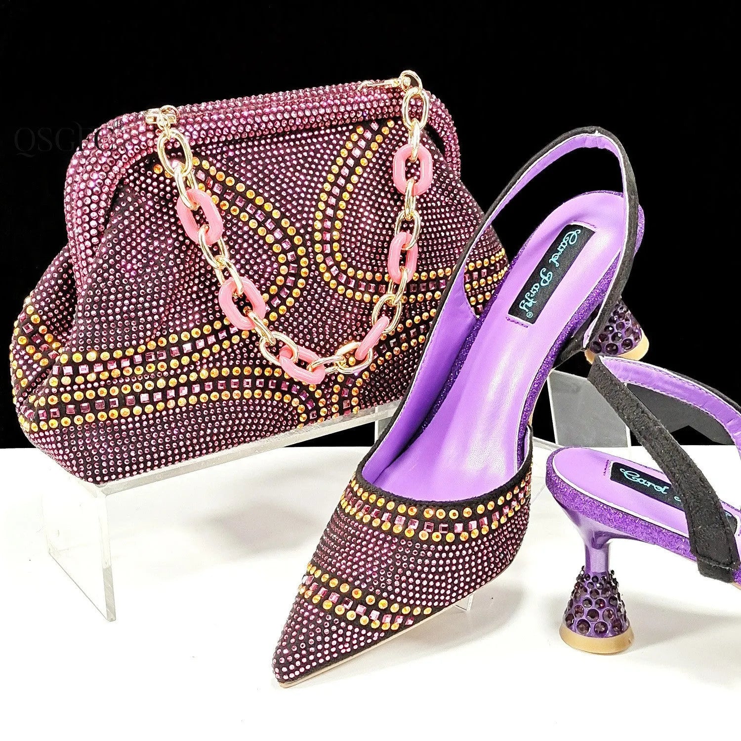 Women's pointed toe high heel shoes with rhinestone decoration and matching small bag in synthetic leather