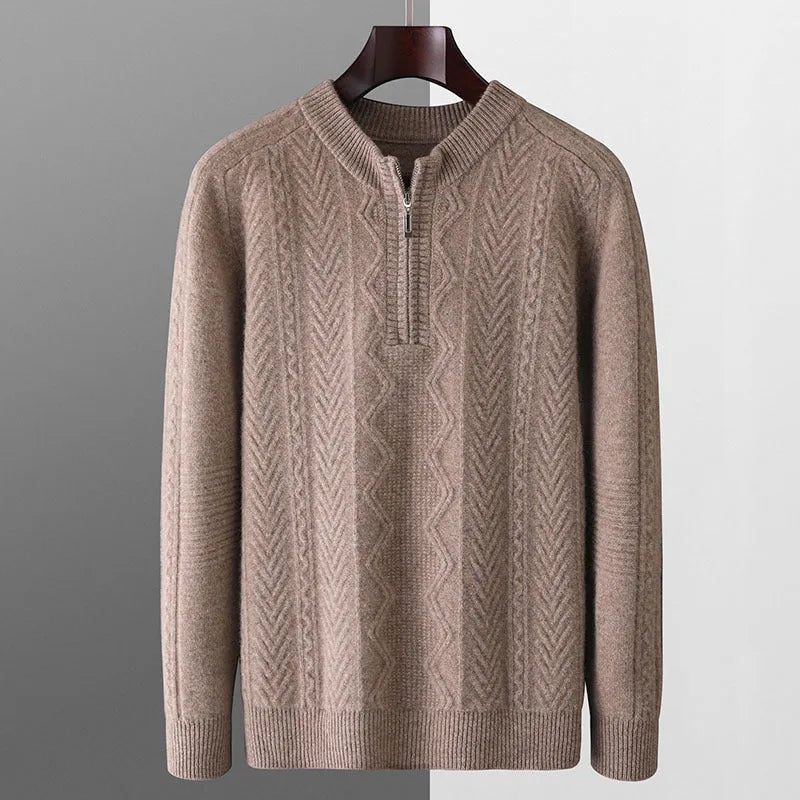 Men's grey wool half zip sweater with a diamond lattice pattern, shown on a model.