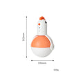 Green and orange electric cat toy chicken with laser light and sound features on a floor