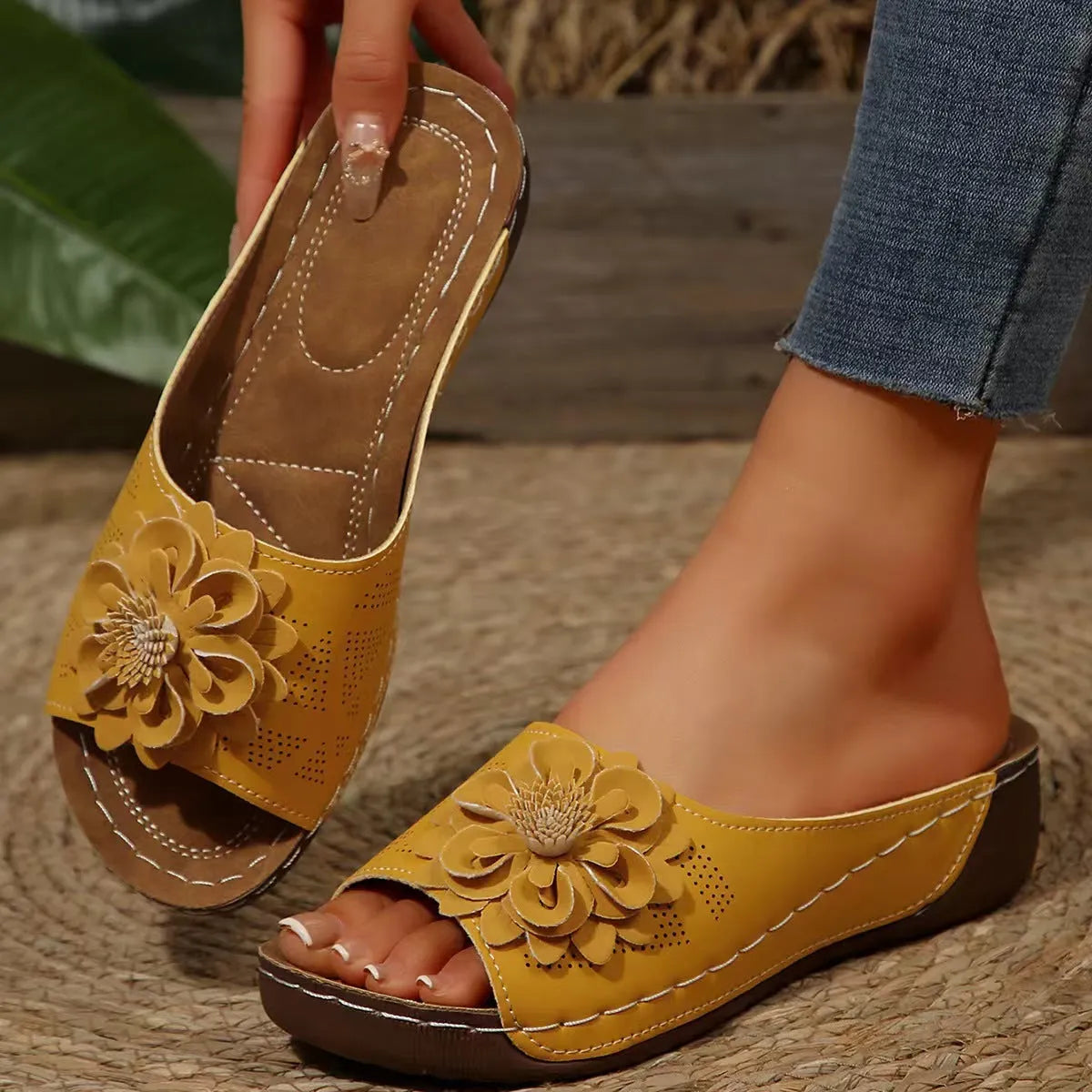 Women's peep-toe slipper with PVC upper and thick rubber sole, shown in a selection of colours.