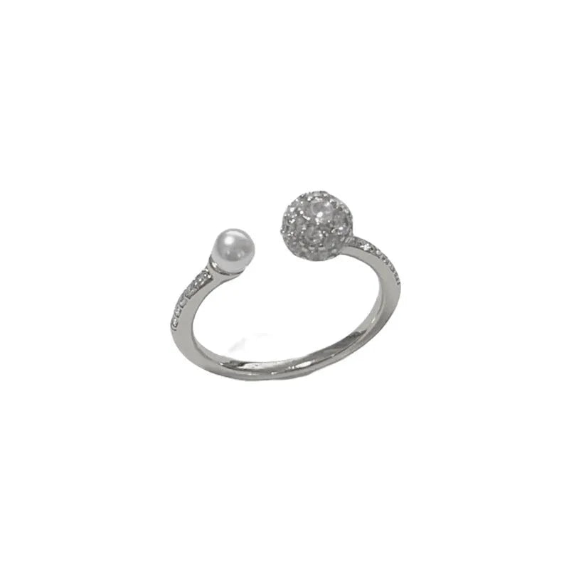 Open-end geometric pearl ring with round zircon accents in gold or silver finish