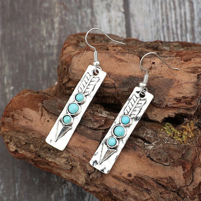 Silver geometric long strip earrings with zinc alloy construction and retro design
