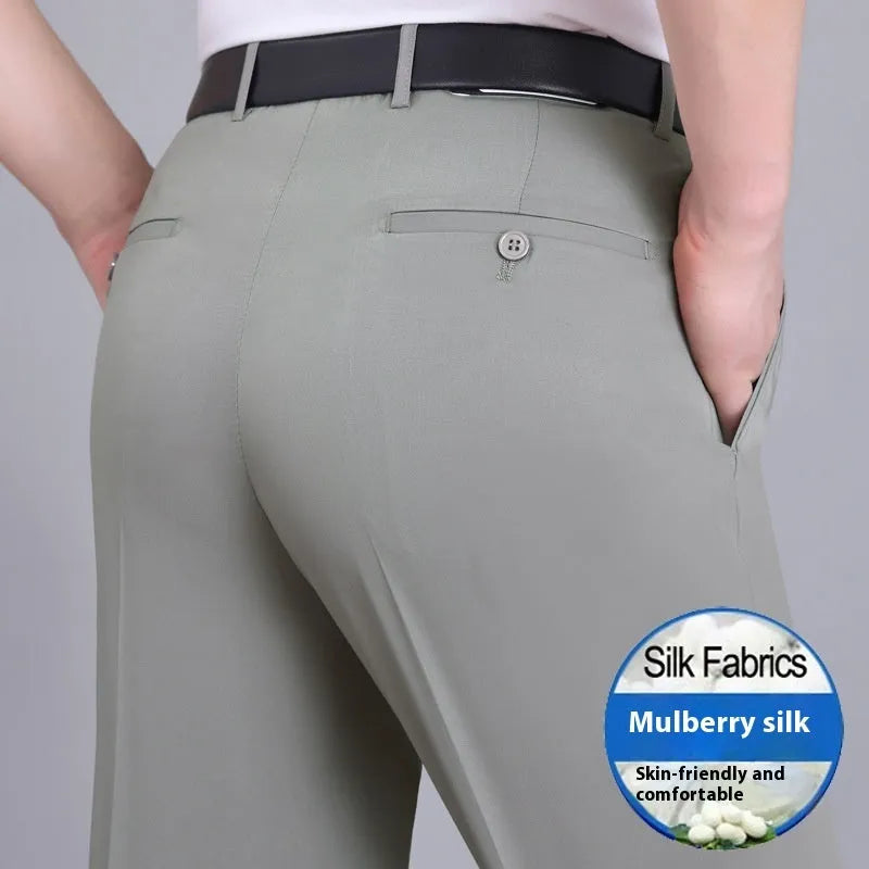 Men's dark blue straight-leg business trousers with a high waistband on a hanger.