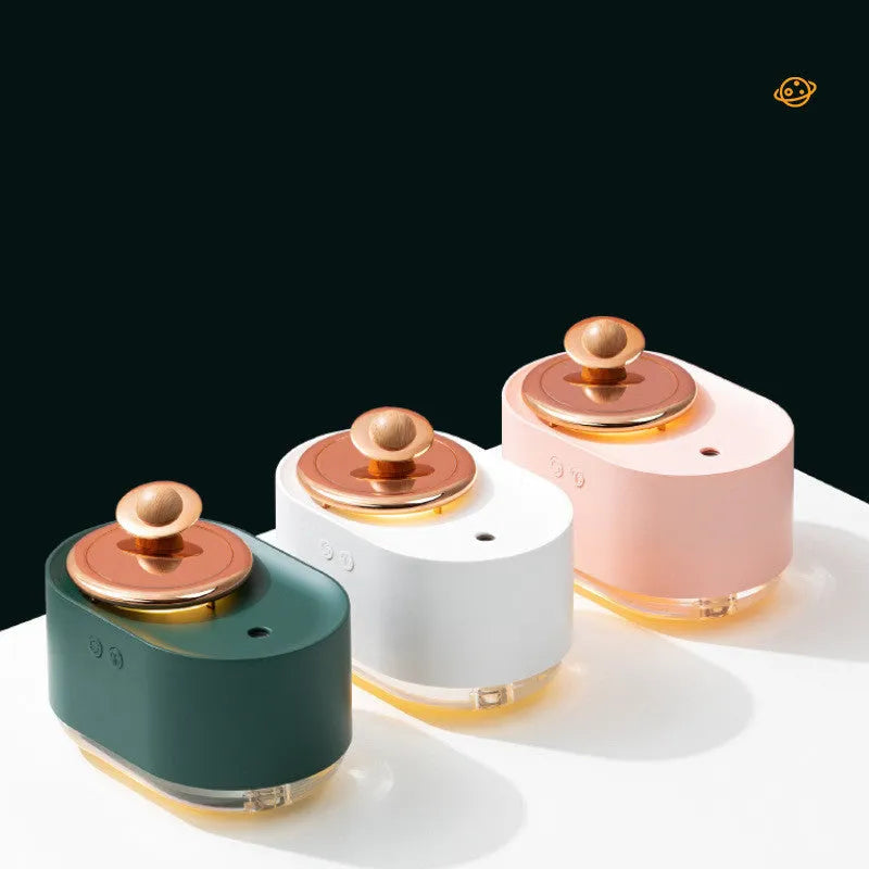 Rotating planet USB humidifier with night light in green, pink, or white colours