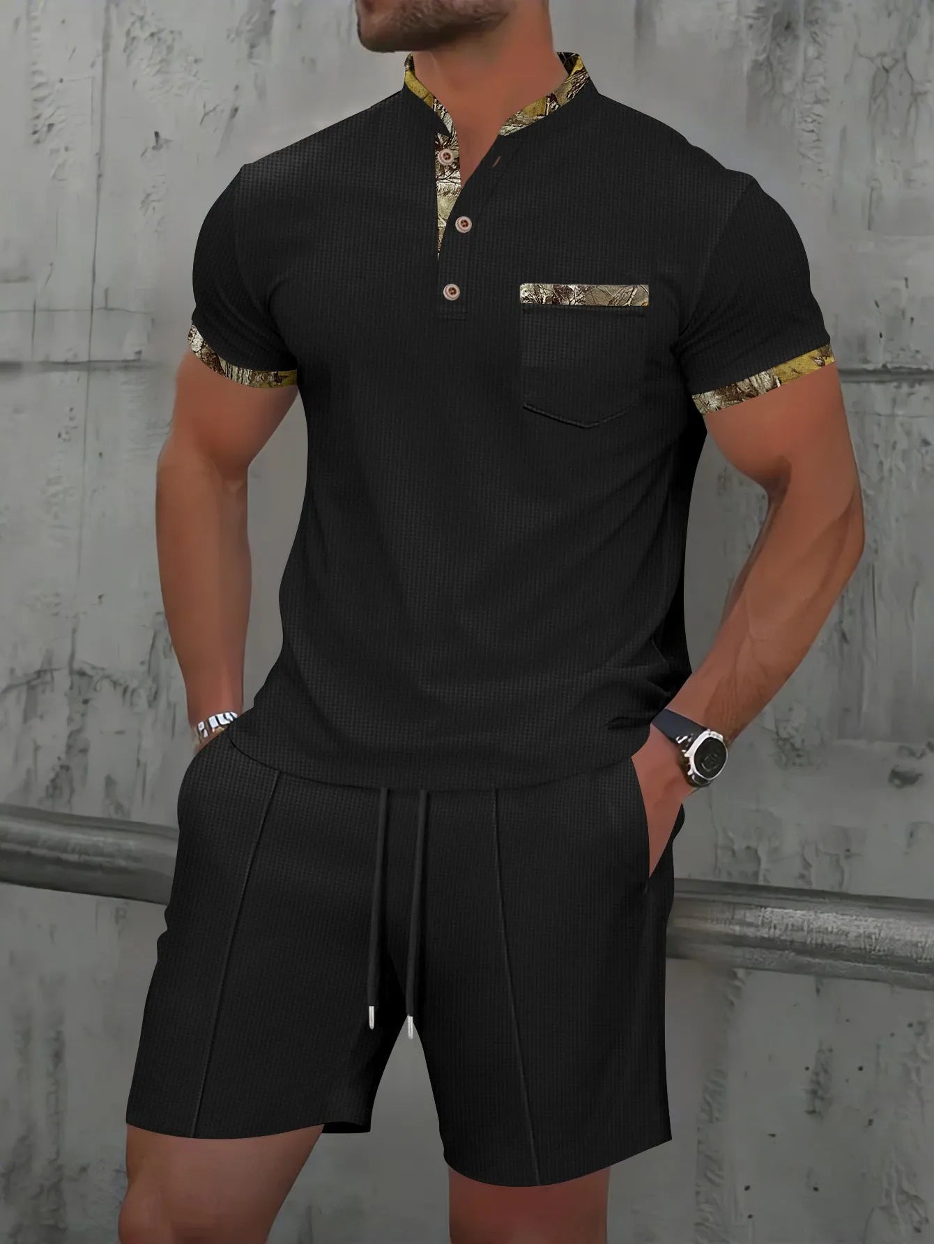 Men's grey waffle zipper polo collar short sleeve top and matching shorts laid flat