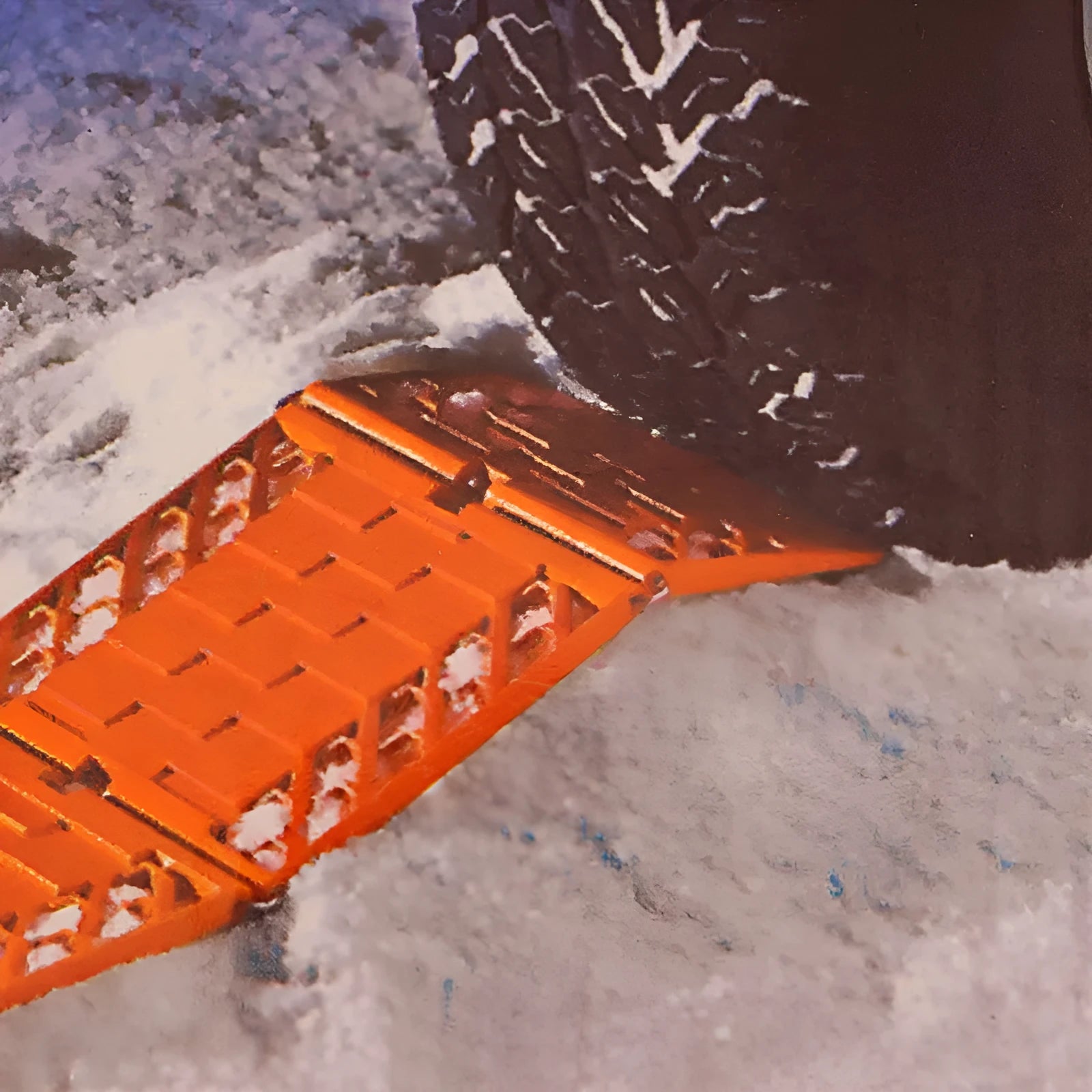 Folding anti slip mud snow rescue boards for automobiles in orange and red colours showing folded and unfolded positions