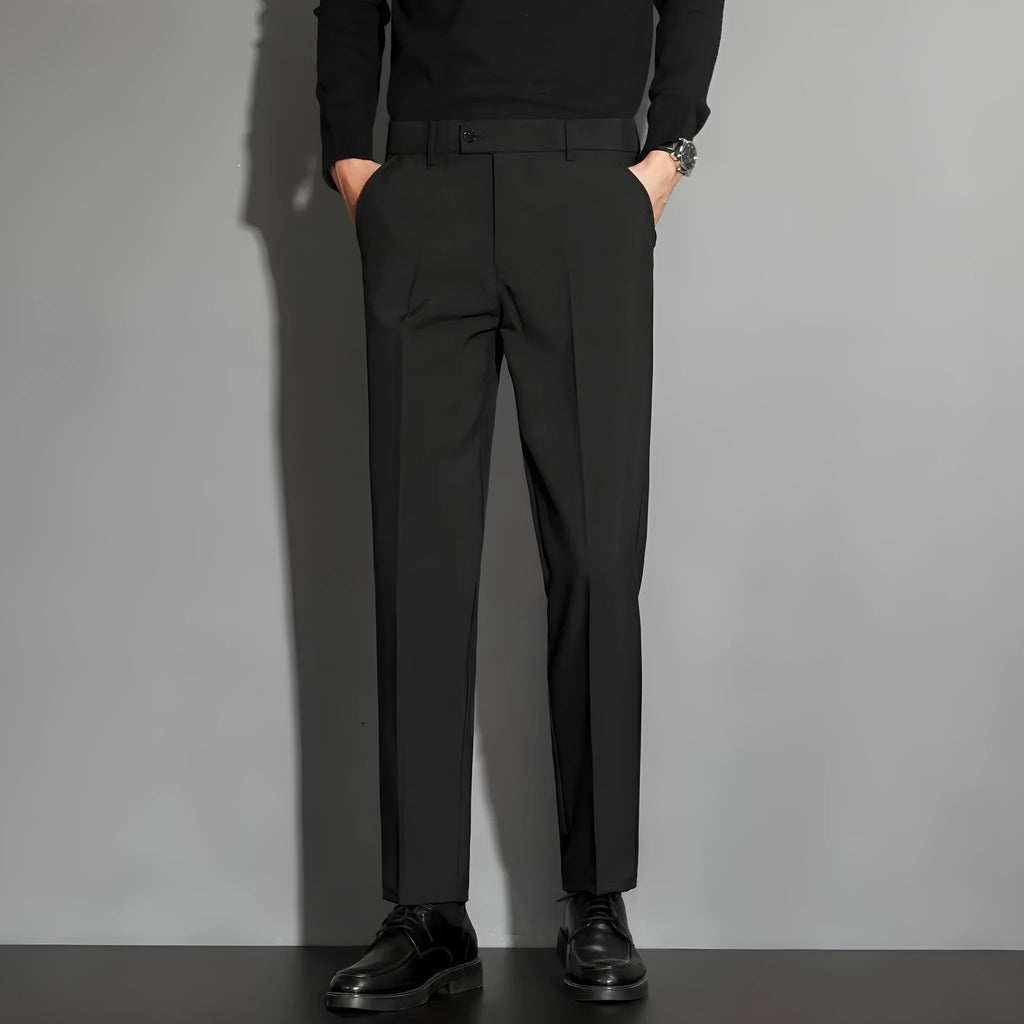 Men's straight leg ankle-length suit trousers in apricot colour on a model