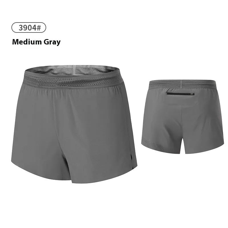Men's solid colour polyester basketball shorts with low waist design on a neutral background.