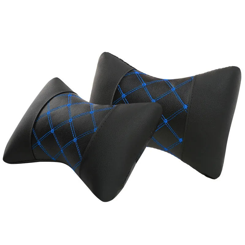 Black quilted diamond pattern car headrest pillow with coloured stitching for neck support.