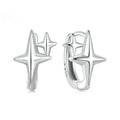 Minimalist star sterling silver ear clips with oxidation finish and XINGX design element