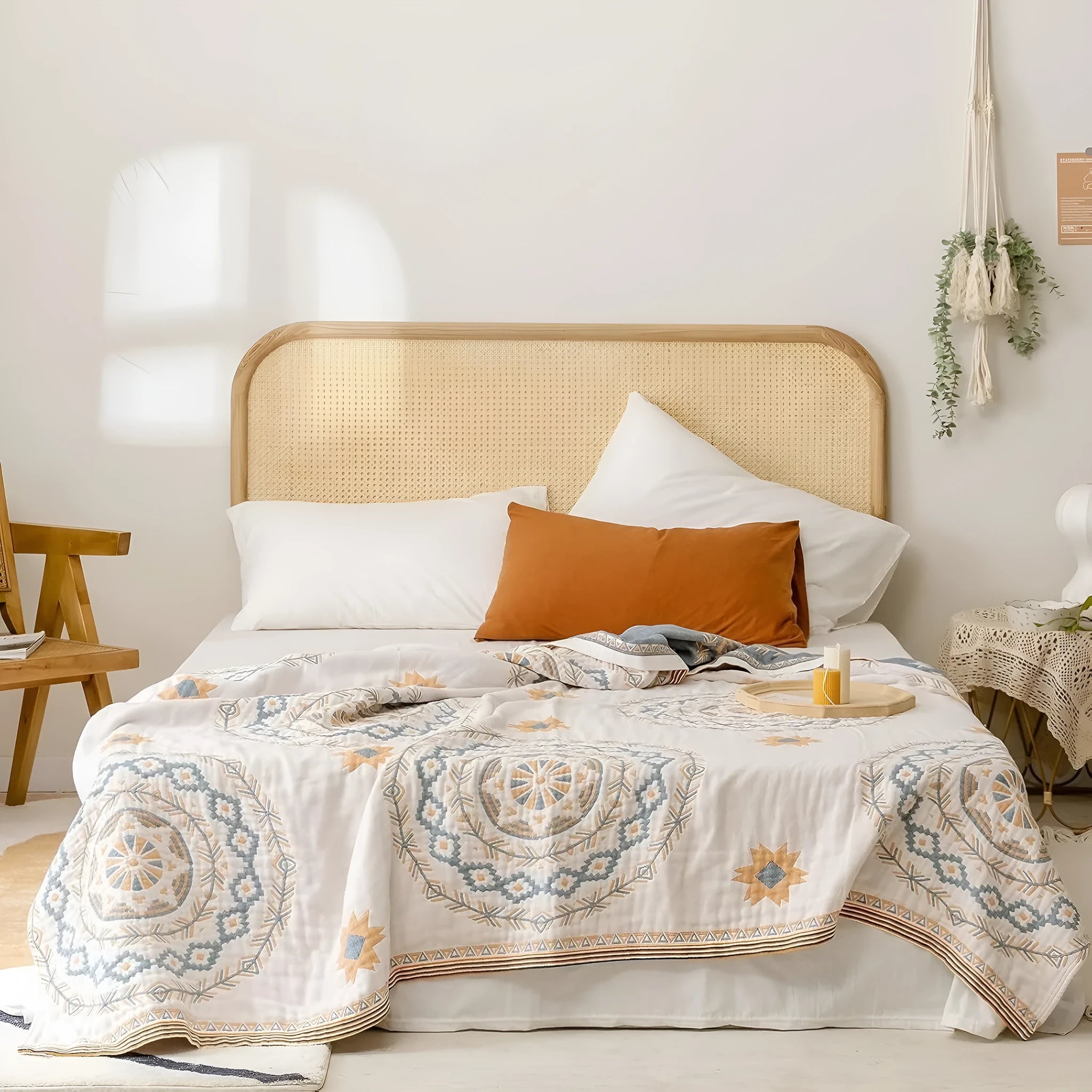 Cotton geometric patterned towel blanket laid flat, showing modern design and available size options.