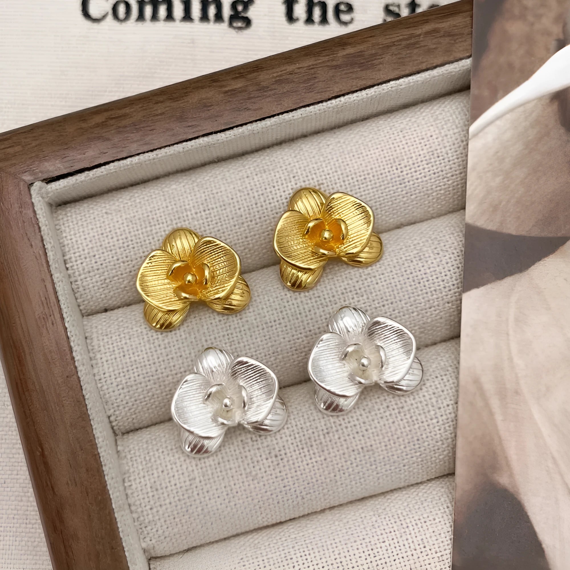 Retro flower earrings for women in gold and silver colours with petal detail
