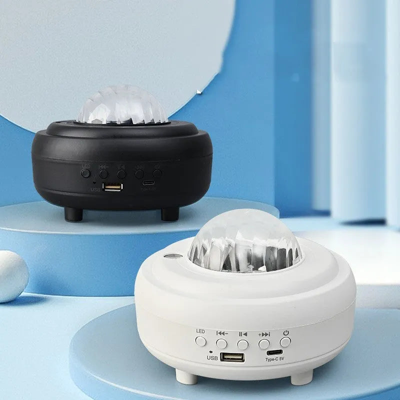 Galaxy star projector night light showing starry sky projection with Bluetooth speaker