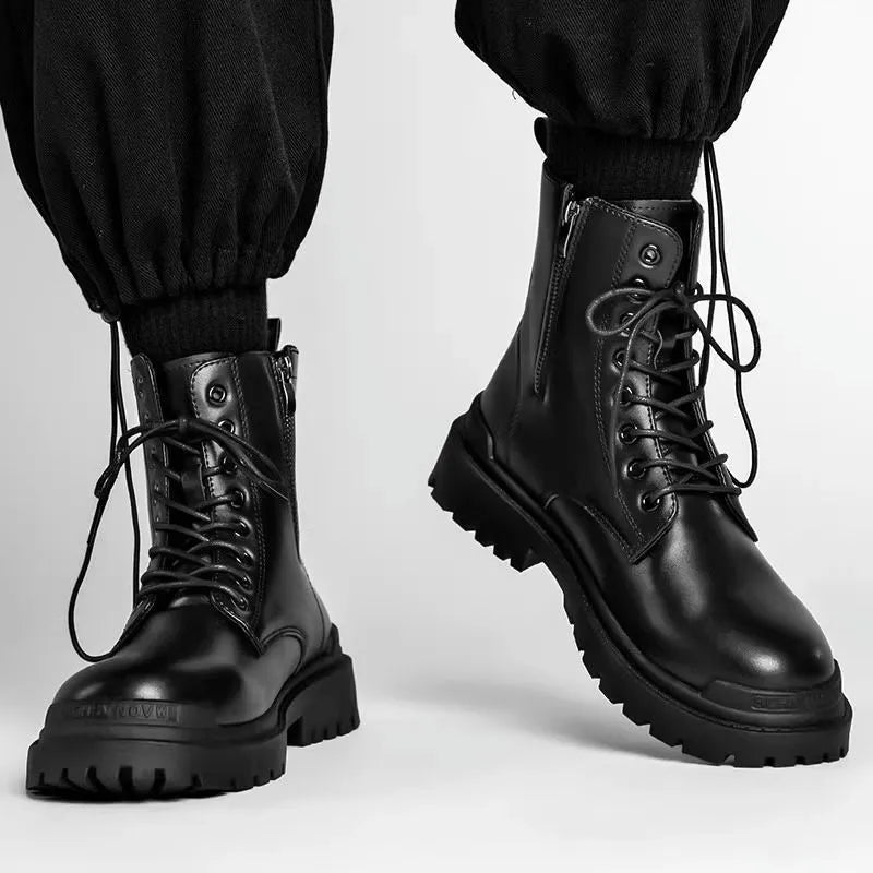 Men's mid-top black waterproof leather boots with non-slip rubber sole on flat surface
