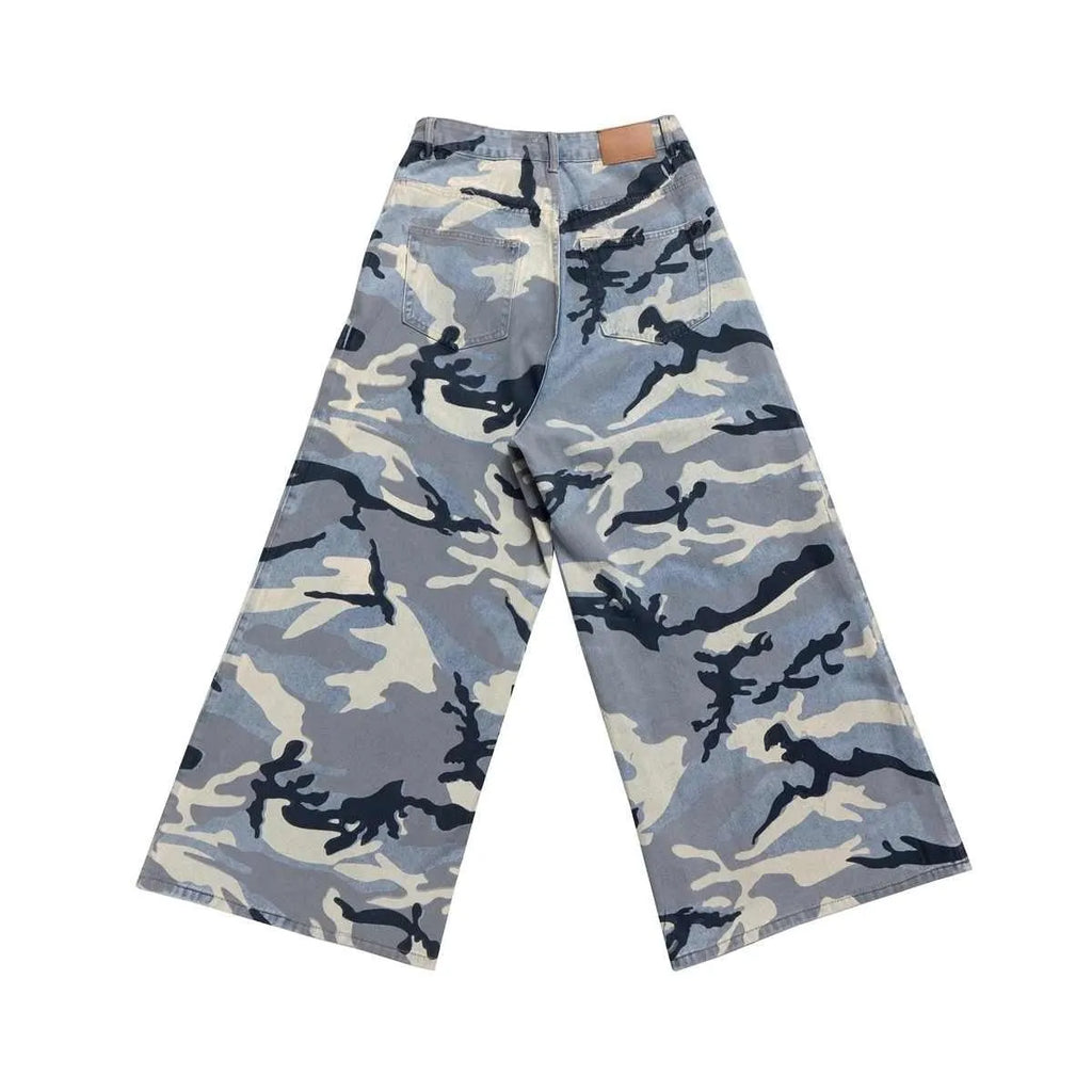 Snow camouflage blue loose-fit denim jeans laid flat, showing mid waist and trouser cut.