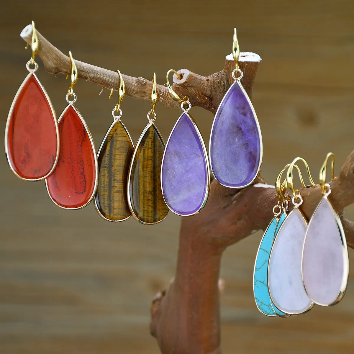 Vintage Tigereye stone drop earrings with handcrafted texture details and water drop pendant shape