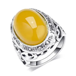 Geometric retro ring with fluorescent beeswax detailing on antique silver electroplated alloy