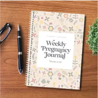 A5 Pregnancy Weekly diary notebook open on a weekly spread