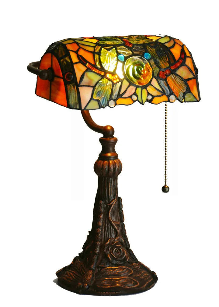 10-inch Tiffany stained glass table lamp with resin base on a wooden desk.