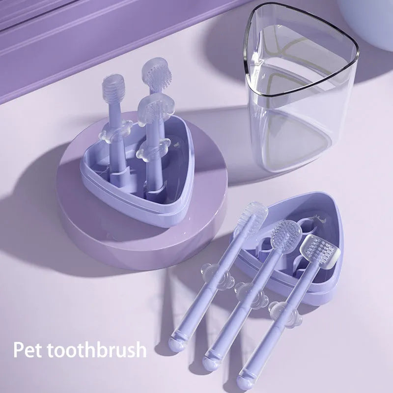 Soft silicone pet toothbrush for dogs and cats in purple, blue, and green colour options.