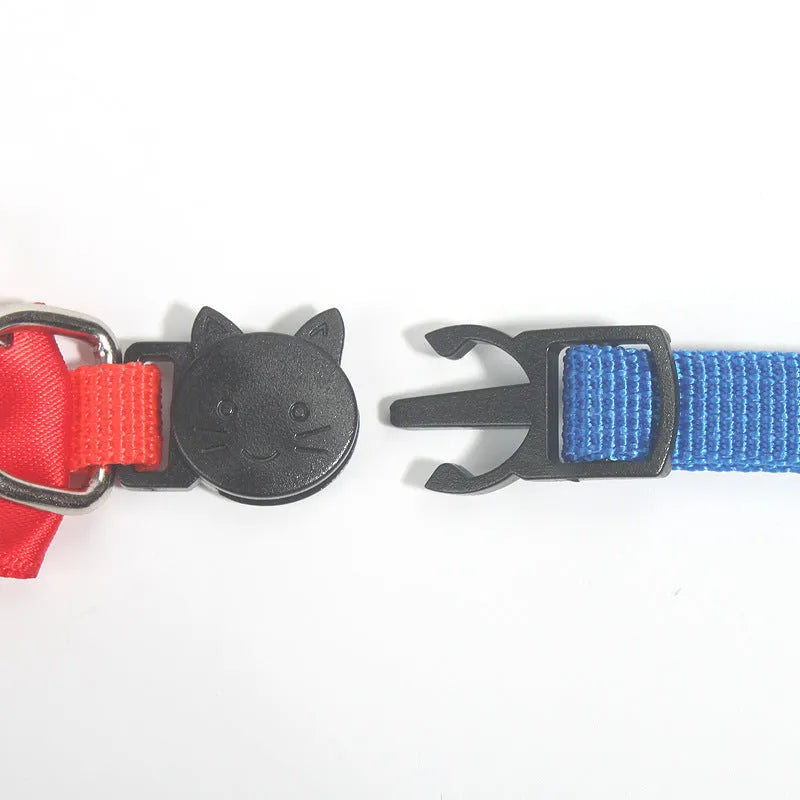 Striped multi-colour adjustable nylon cat collar with a small bell attached.