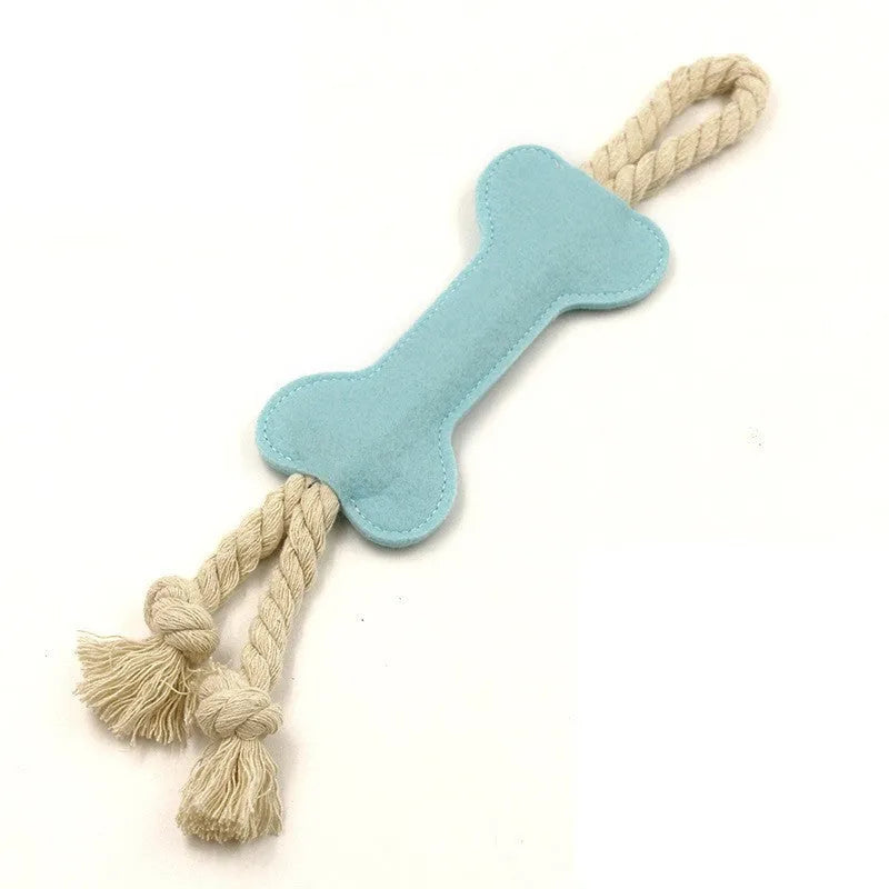 Bone-shaped dog chew toy with felt exterior showing rope knot texture inside, 16cm long in blue colour
