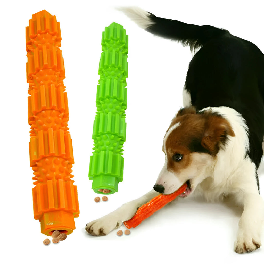 Green and orange durable rubber dog chew toy with squeaker and treat-dispensing hole.