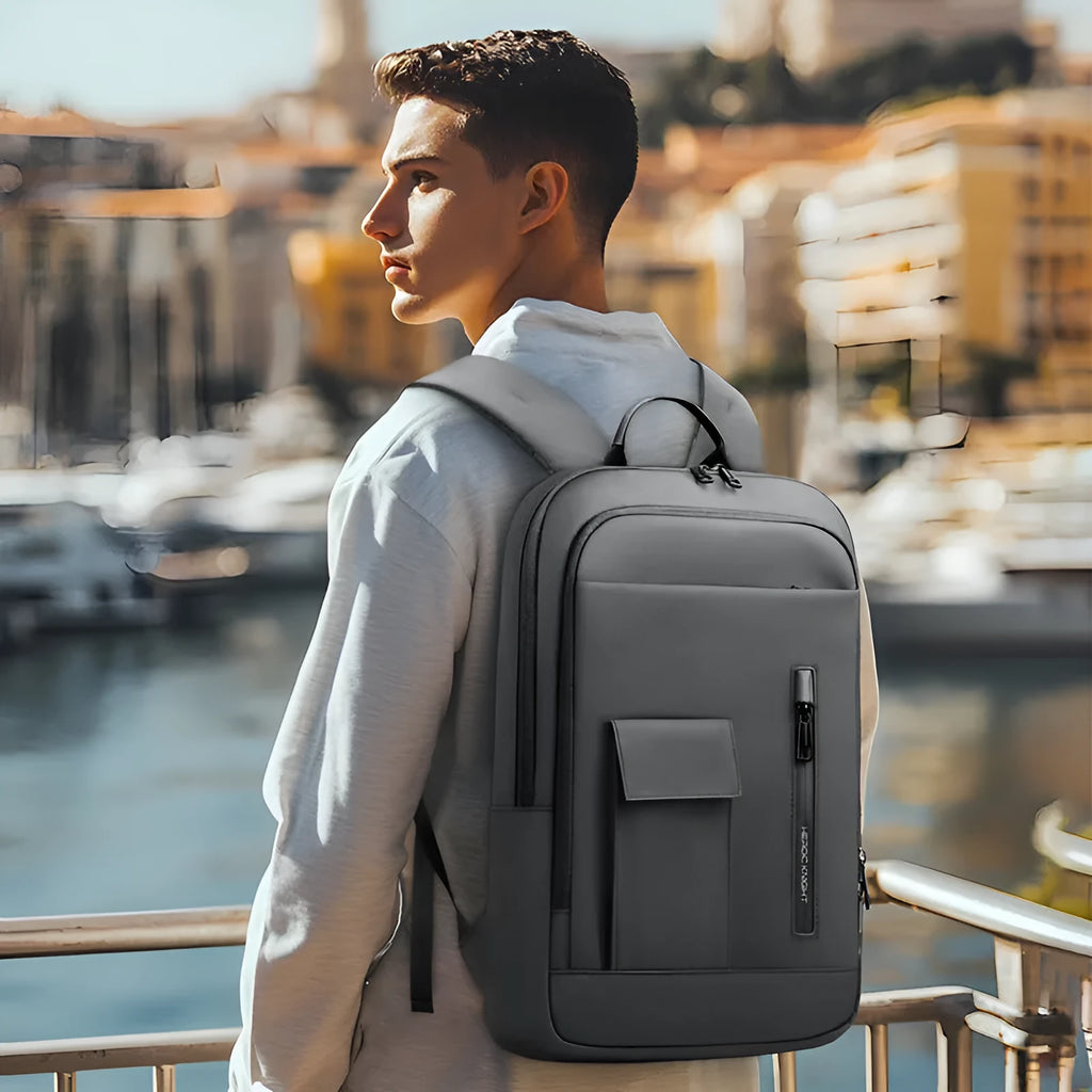 Lightweight Oxford cloth men's backpack in a solid colour with visible sewing lines.
