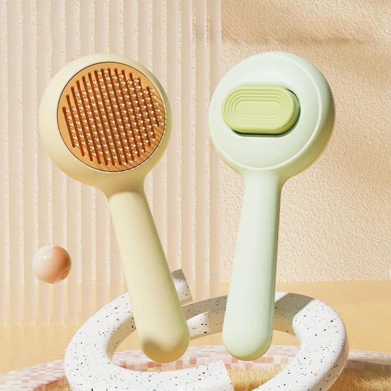 Cat grooming brush with stainless steel comb teeth and non-slip green or yellow handle
