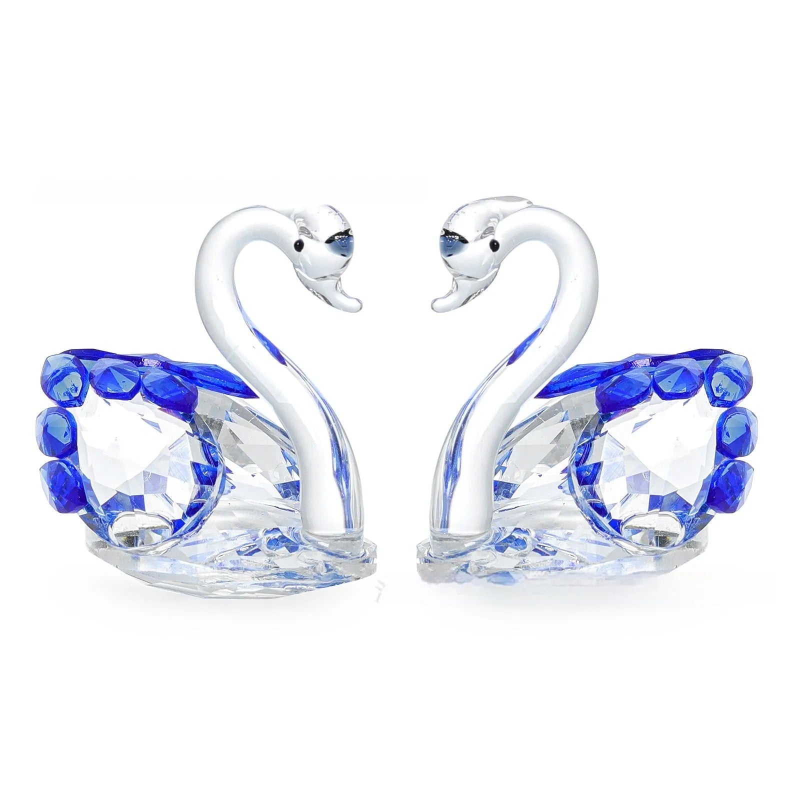 White crystal swan ornament on a desktop, shown in solid head and empty tube styles in red, blue, pink, and purple.