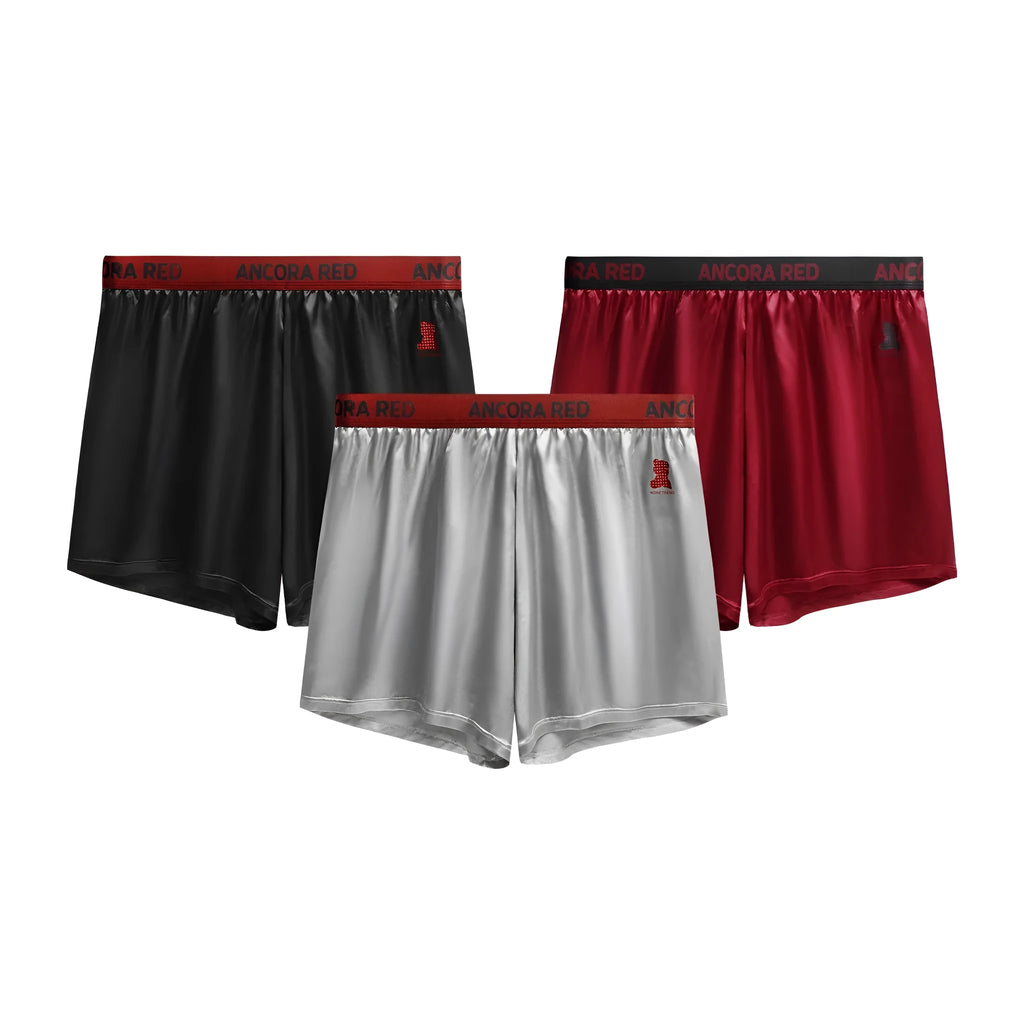 Men's solid colour boxer briefs showing mid-waist design and knitted polyester fabric in multiple colour options