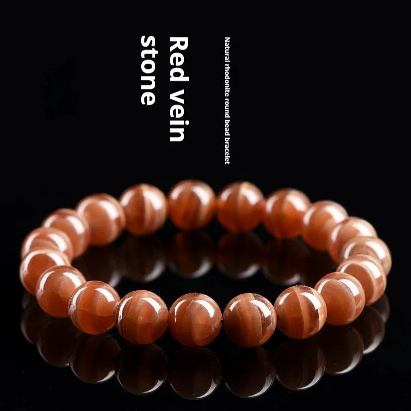 Natural Old Mine Rhodochrosite round bead bracelet with Ruyi elements in 6mm or 8mm bead options