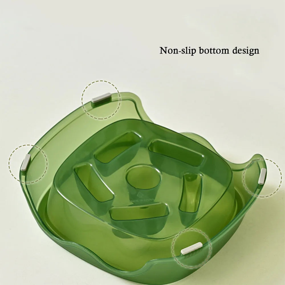 Blue plastic slow feeder dog bowl for anti-choking feeding on a plain surface.